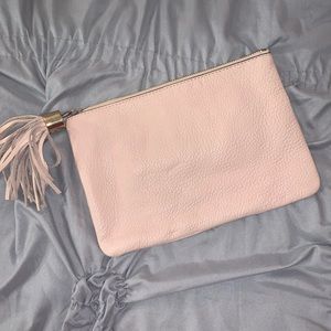 Light pink clutch with tassel